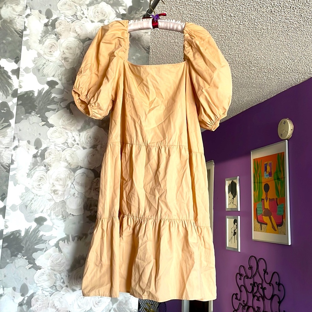 Knee length straight neck tan dress